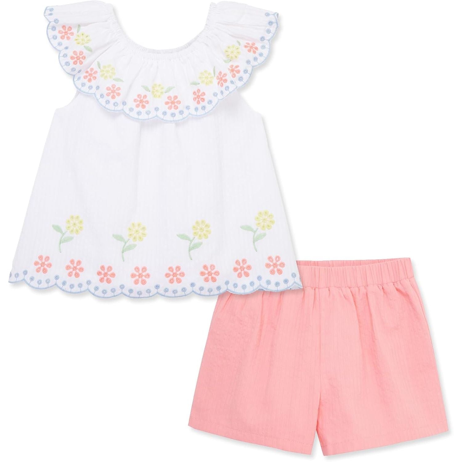 White top with floral embroidery and pink shorts on a white background