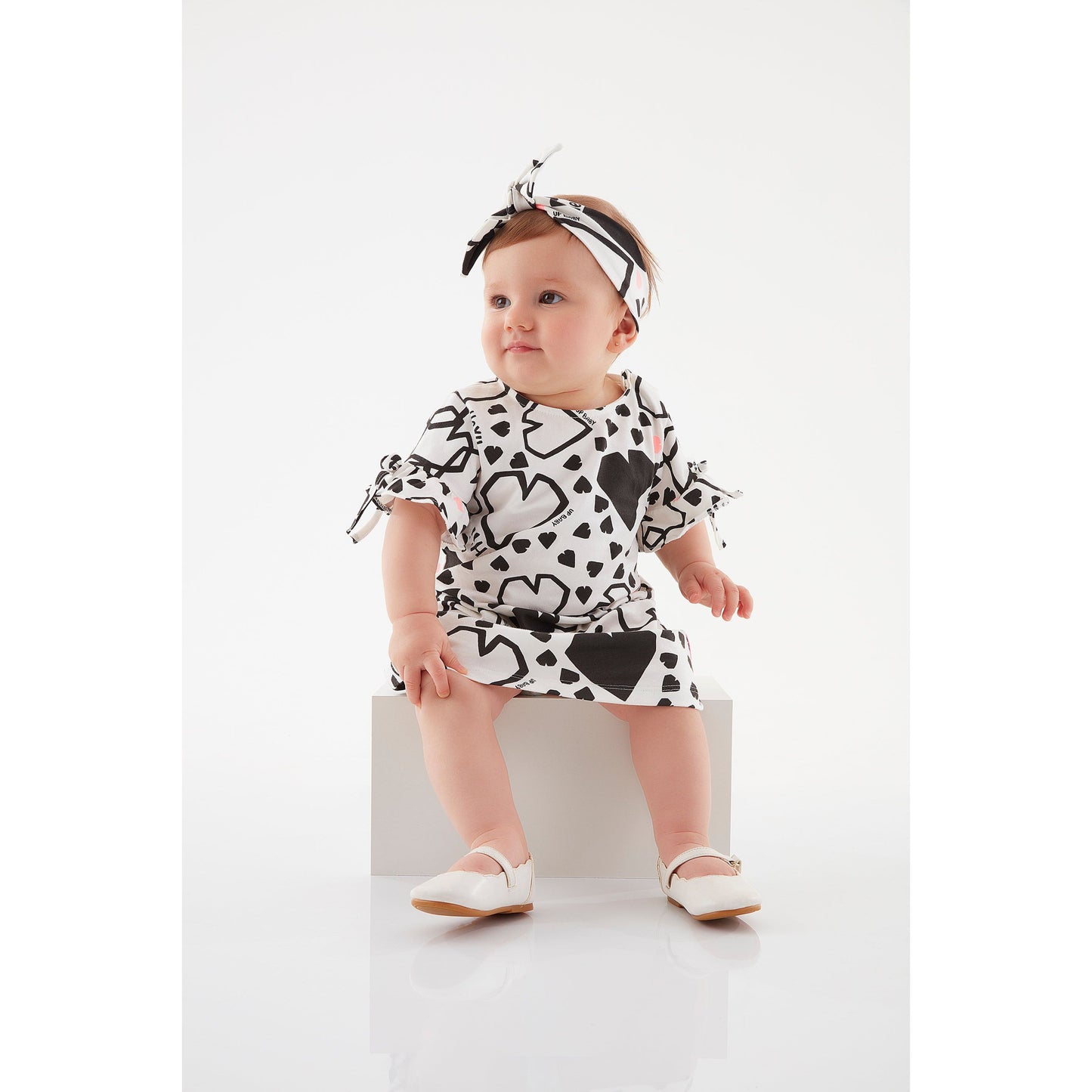 hearts all around b&w tunic