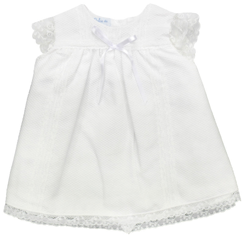 white piqué dress with tiny bow and lace