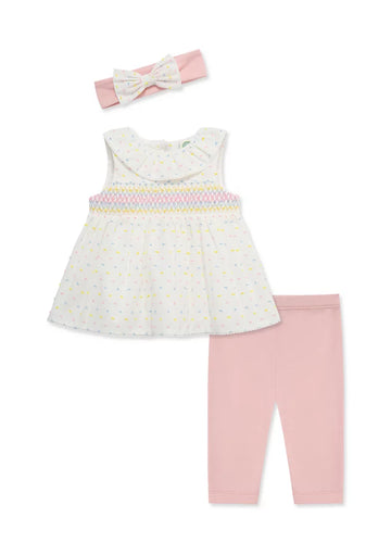 A baby girl's three-piece outfit set featuring a white smocked sleeveless top with pastel yellow and blue floral prints, pink smocked stripes, and a matching pink bow headband, paired with light pink leggings.
